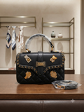 Anti-Tarnish Quilted Chain-Trimmed Satchel with Embellishments, Top Handle, and Detachable Strap